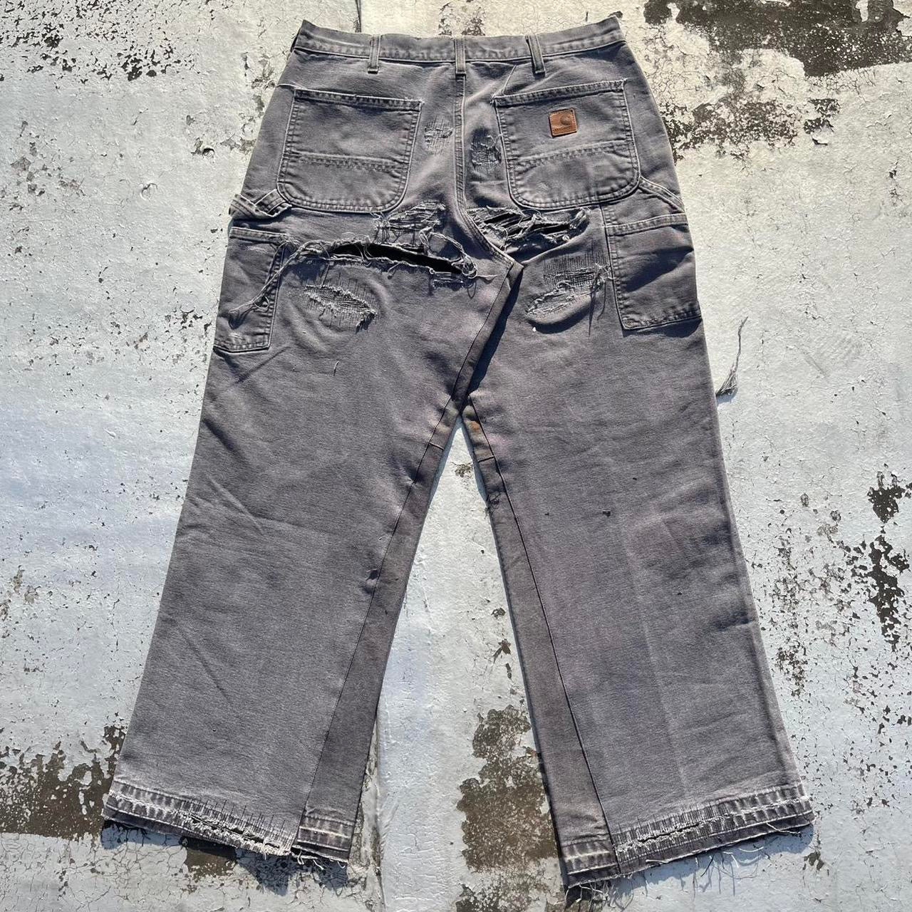 Distressed repaired carpenter pants